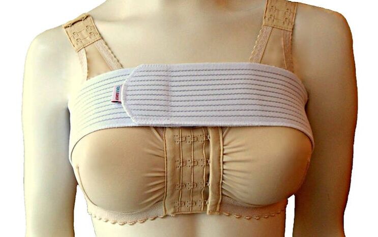 Compression bra after breast enlargement surgery