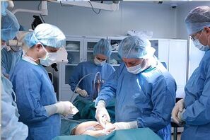 Performing breast enlargement surgery